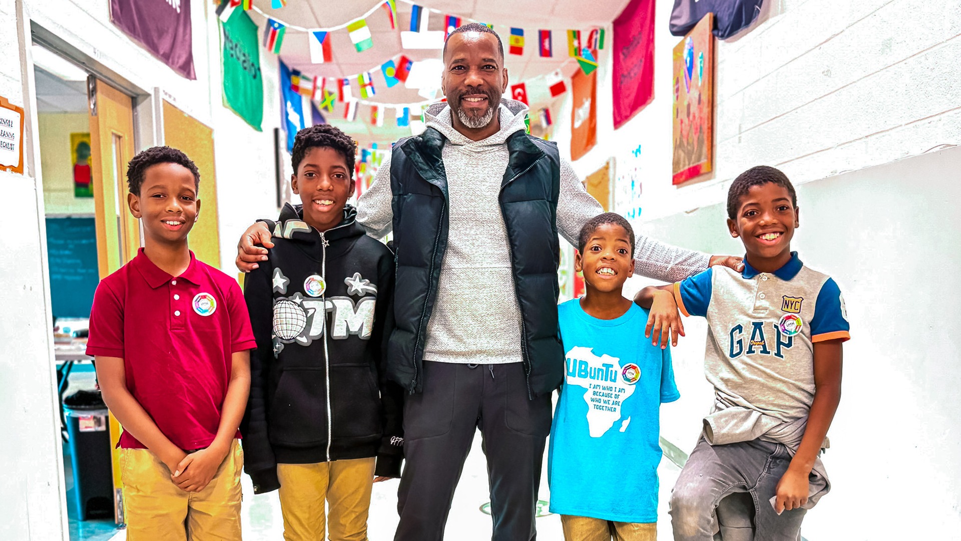 Duane Simpkins with youths from Life Pieces to Masterpieces