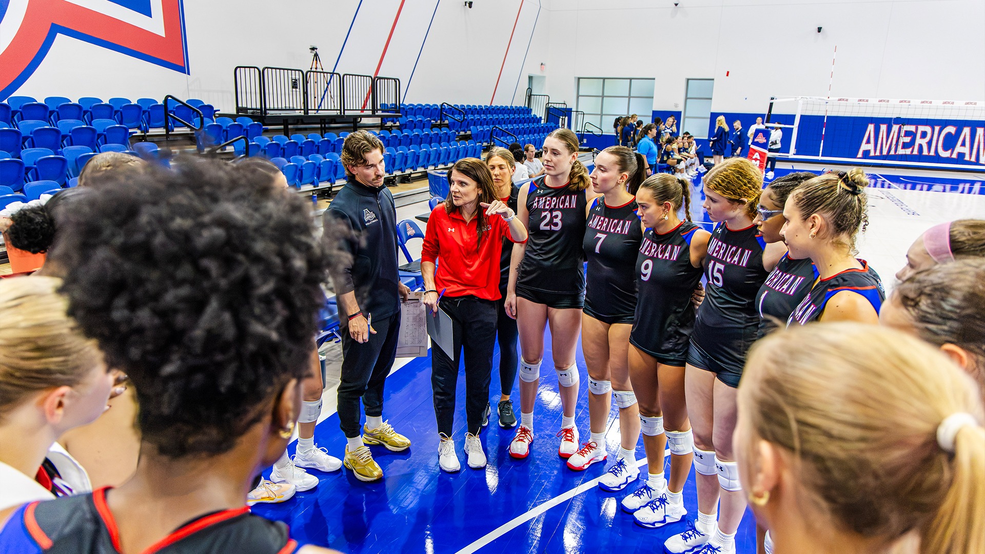The 2026 volleyball team in a huddle