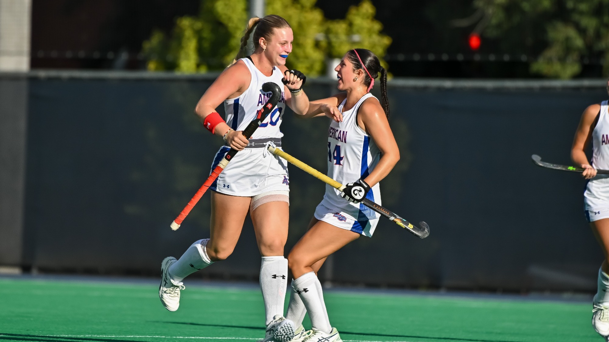 Olivia Morraye and Kendall Varty celebrating after Morraye's goal.