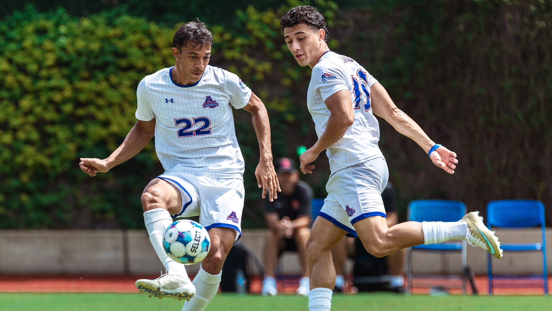 Javi Gonzalez and Sebastian Garces playing soccer. 