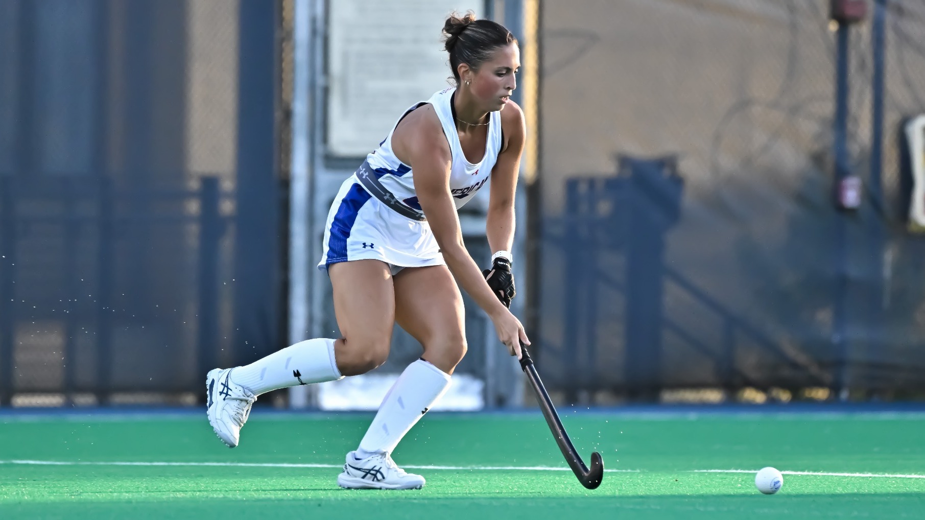Katelyn Dulin carrying the ball down the turf against California.