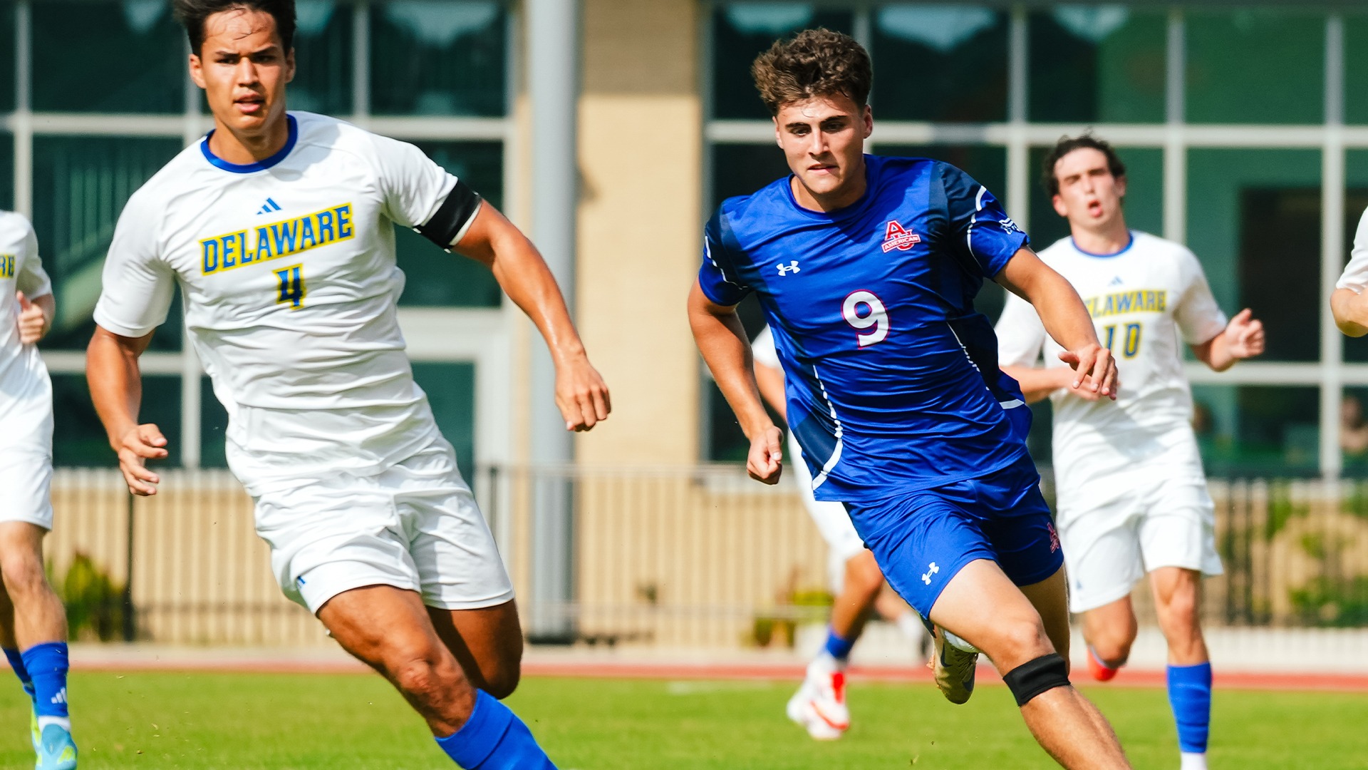 Colin O'Brien playing soccer in a match against Delaware at Reeves Field.