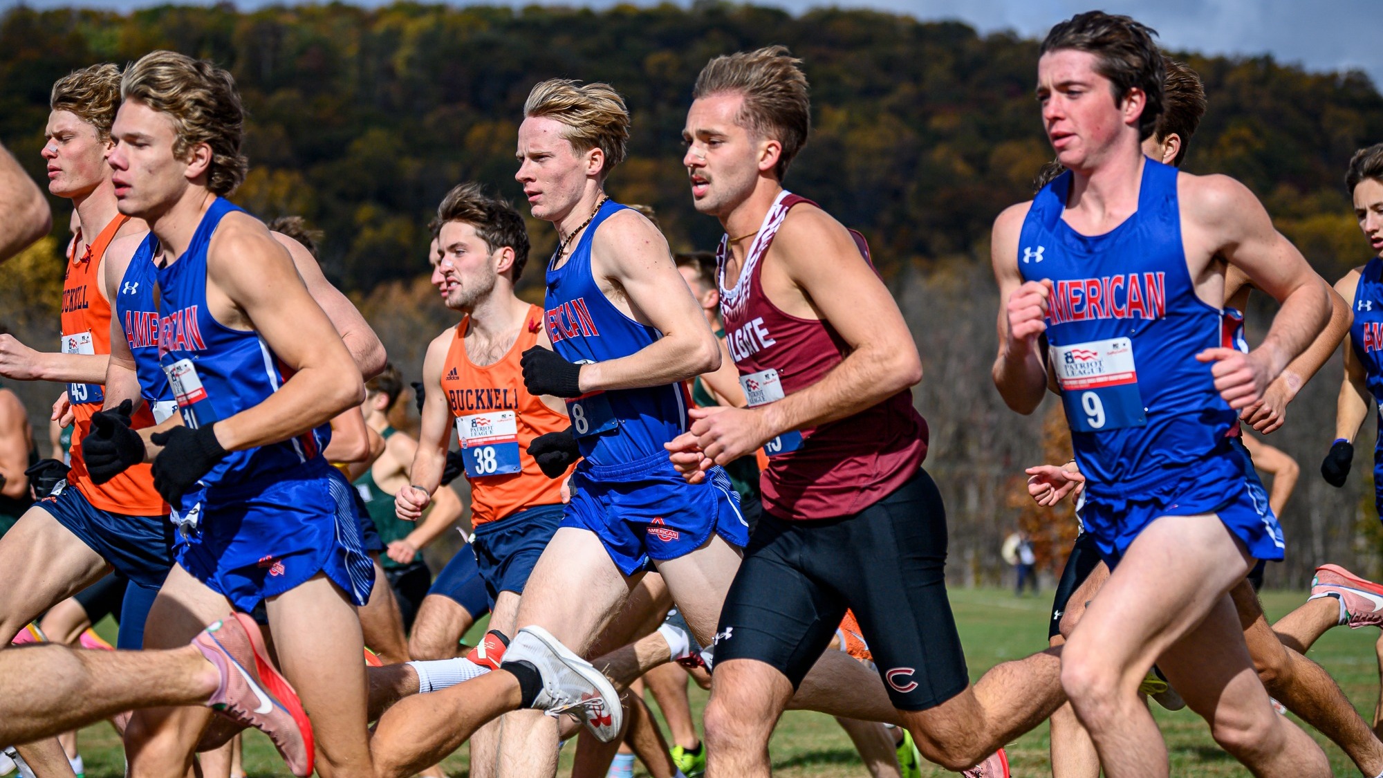 Zack Zerbe, Ty Parker, Noah Smith running at the start of the course at Patriot League Championships.