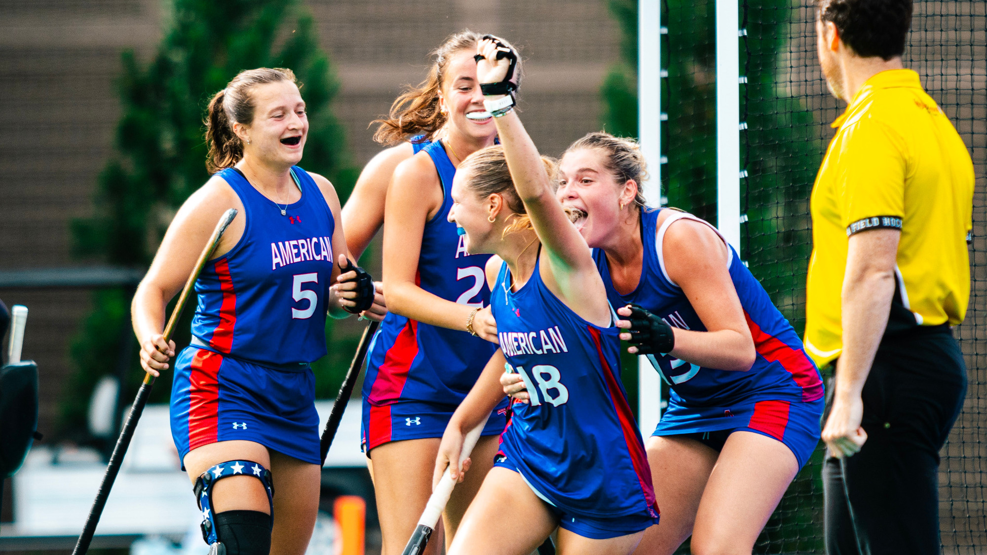 Maura Read celebrating a goal against William & Mary with her teammates. 