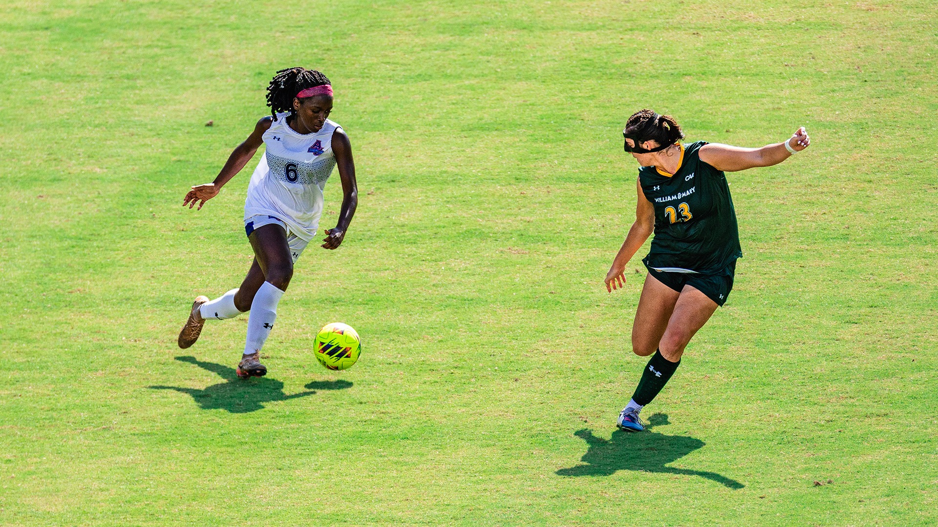 Jenna Etienne-Valtrin with the ball during a women's soccer game