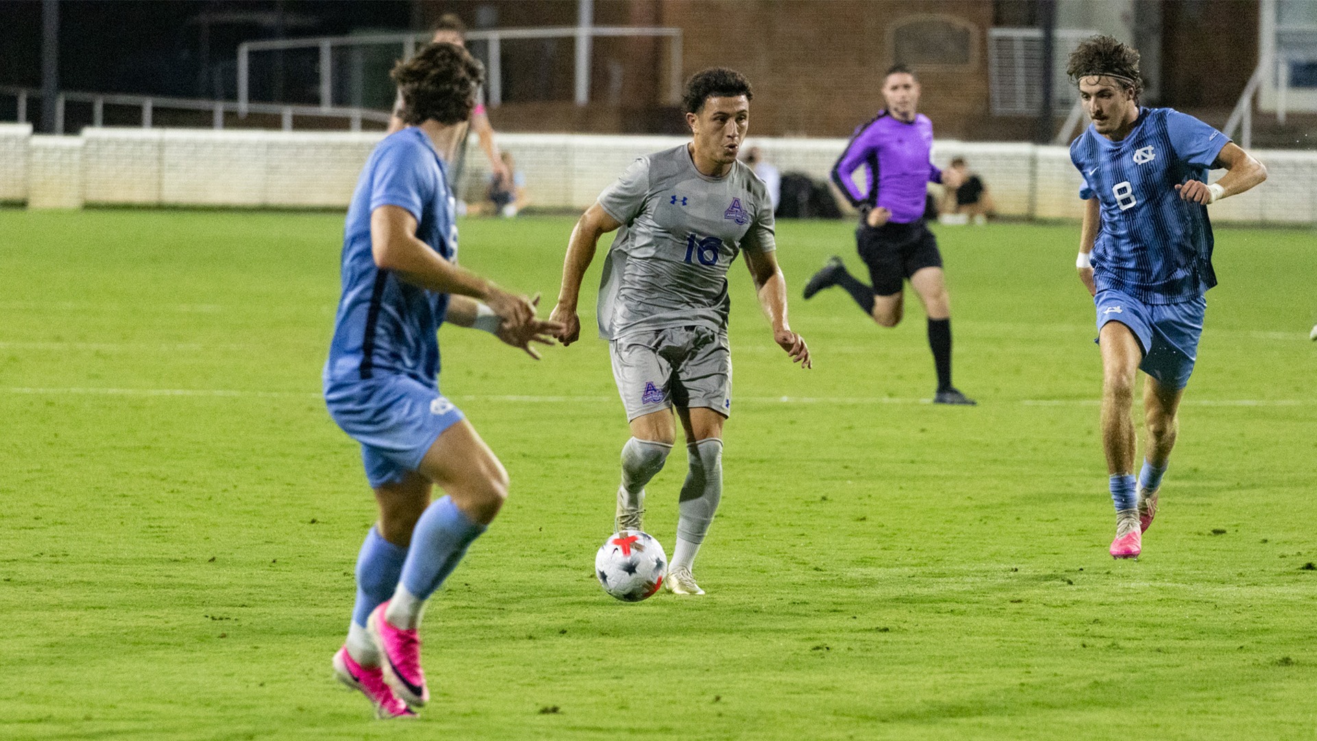 Sebastian Garces dribbling in a match against North Carolina. 