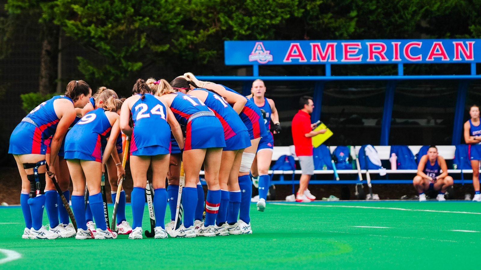 Field hockey huddled on the field pregame against William & Mary.