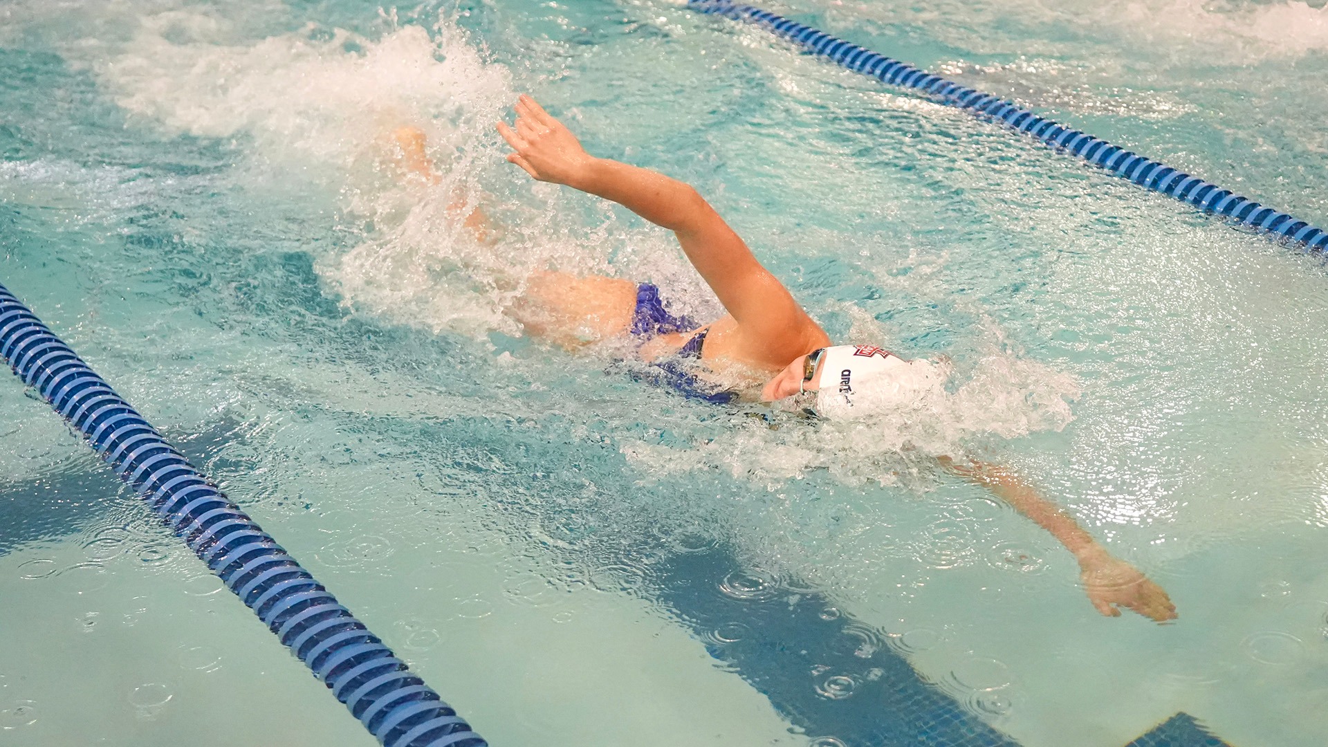 Demetra Bicos swimming for AU