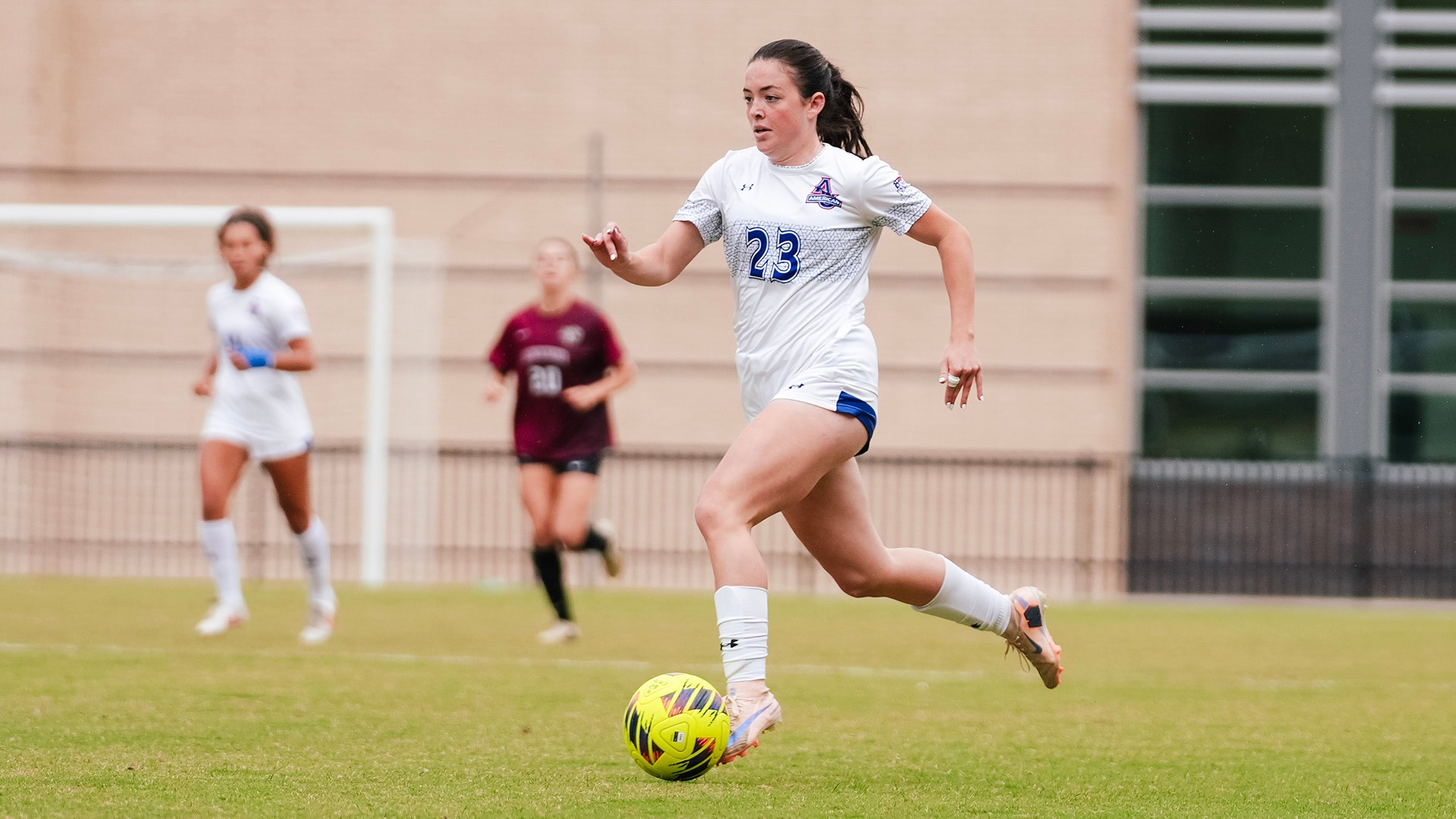 Jayden Fisher with the ball during a women's soccer game against Lafayette