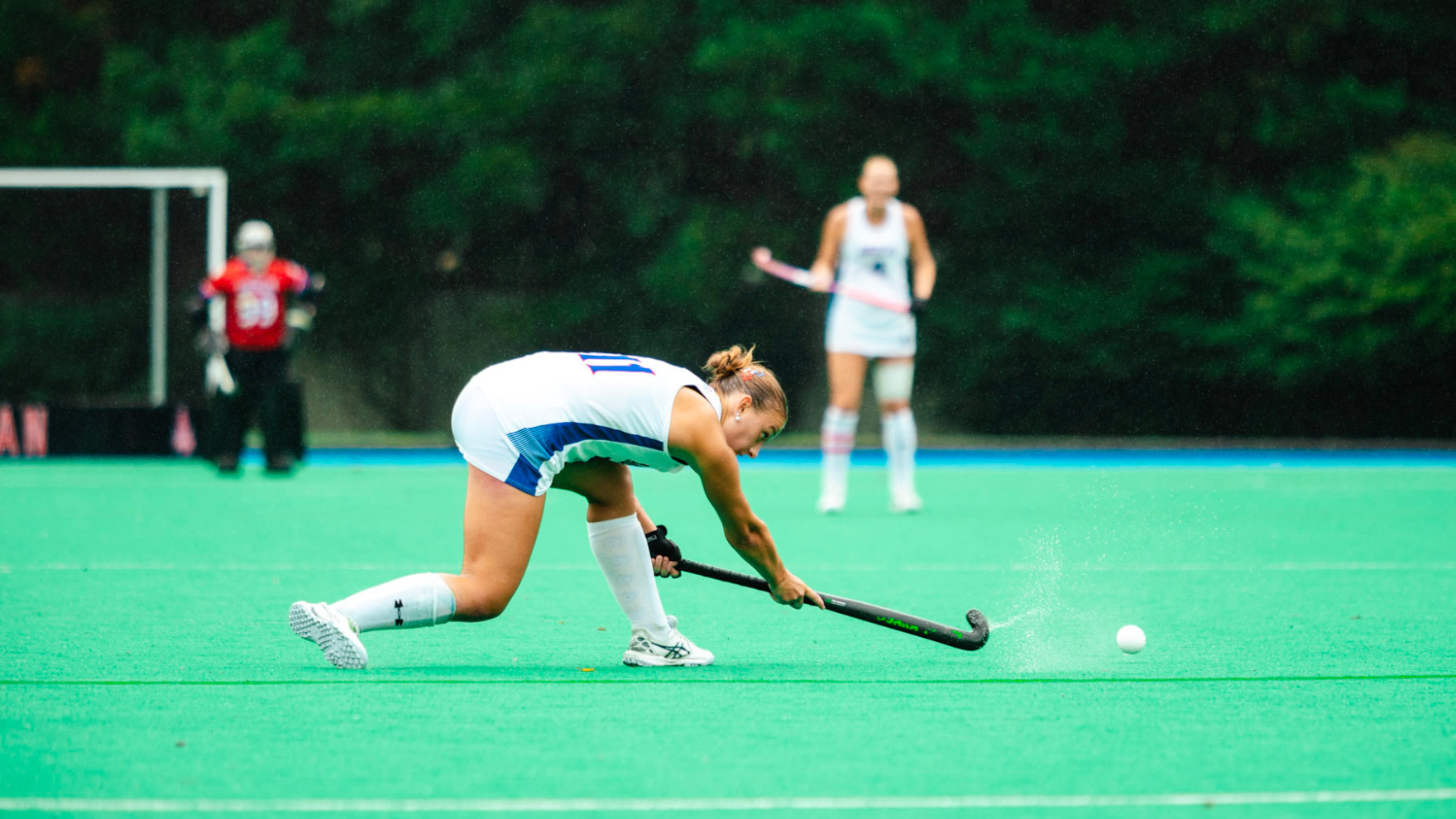 Nora Tromble takes a drag pass.