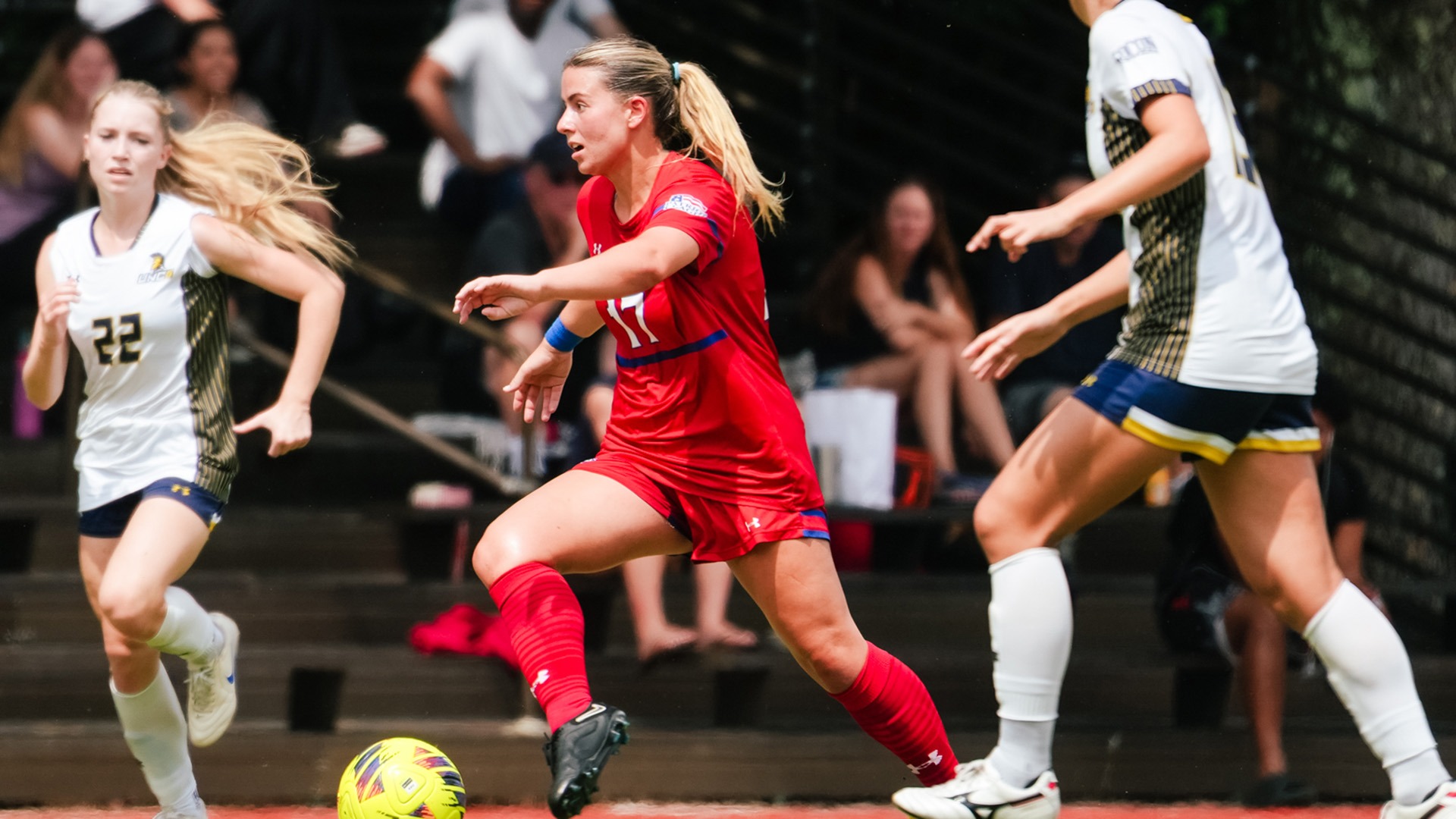 Piper Garcia with the ball during a women's soccer game