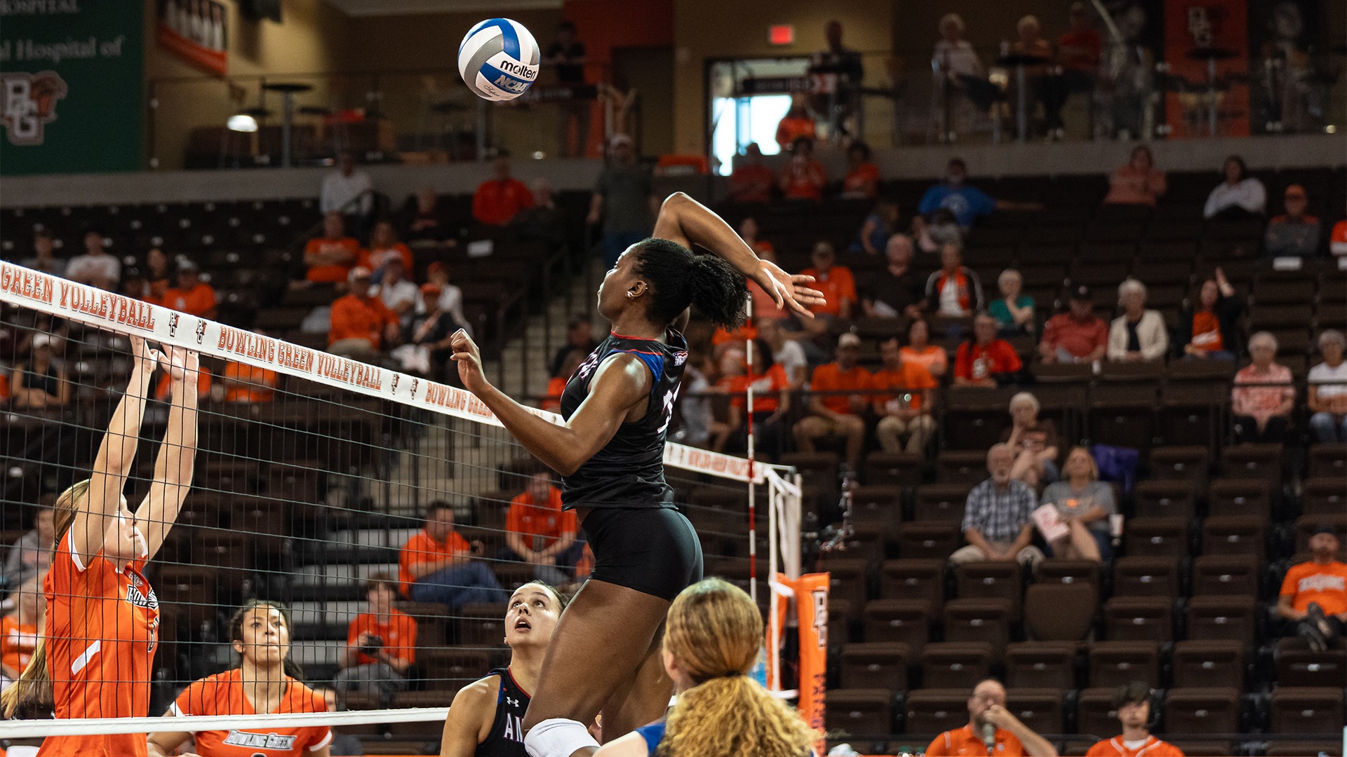 Prinzez Zeck jumping for an attack attempt in a match against Bowling Green. 