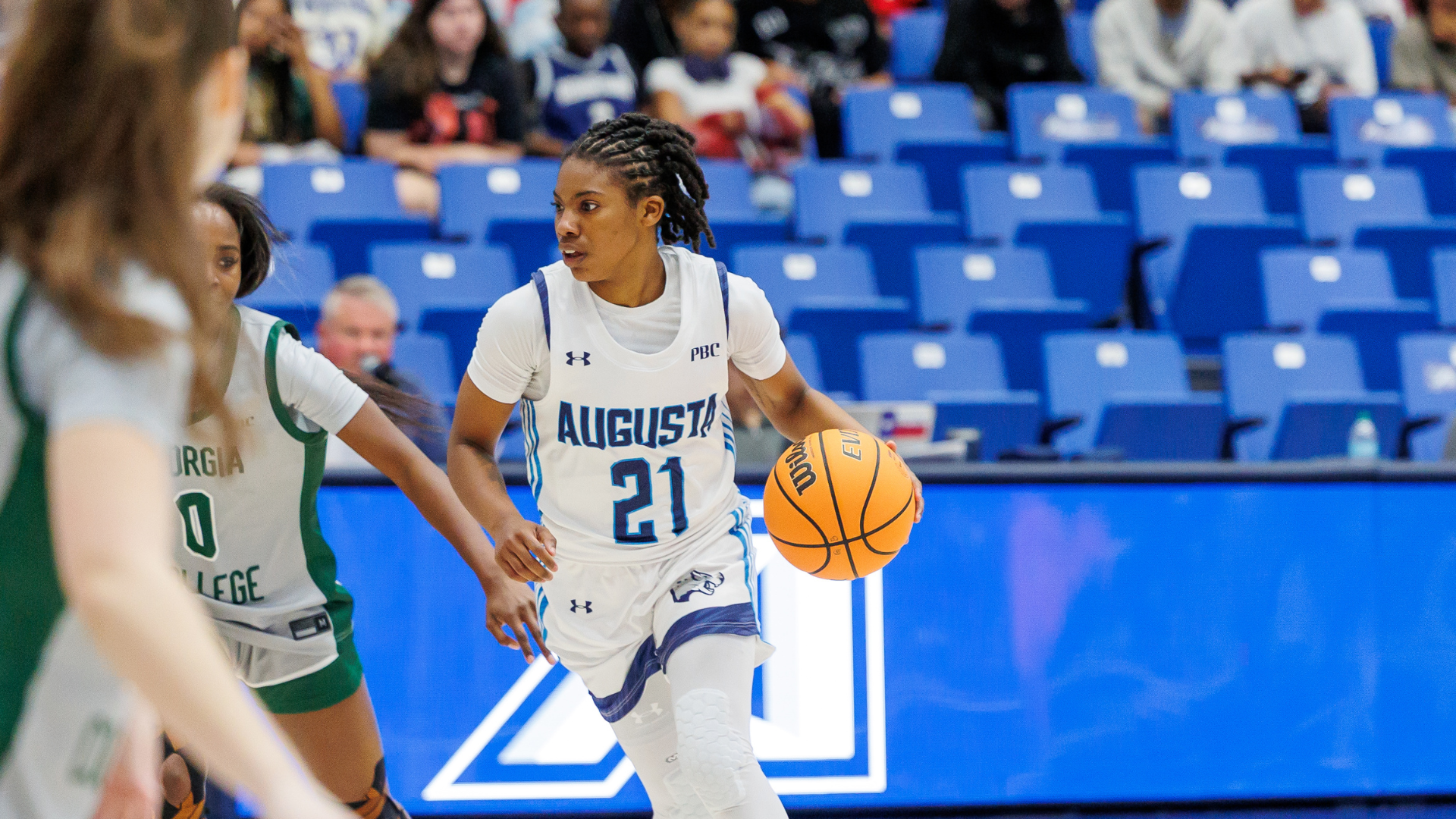 Elyse Autrey (women's basketball) dribbling the basketball