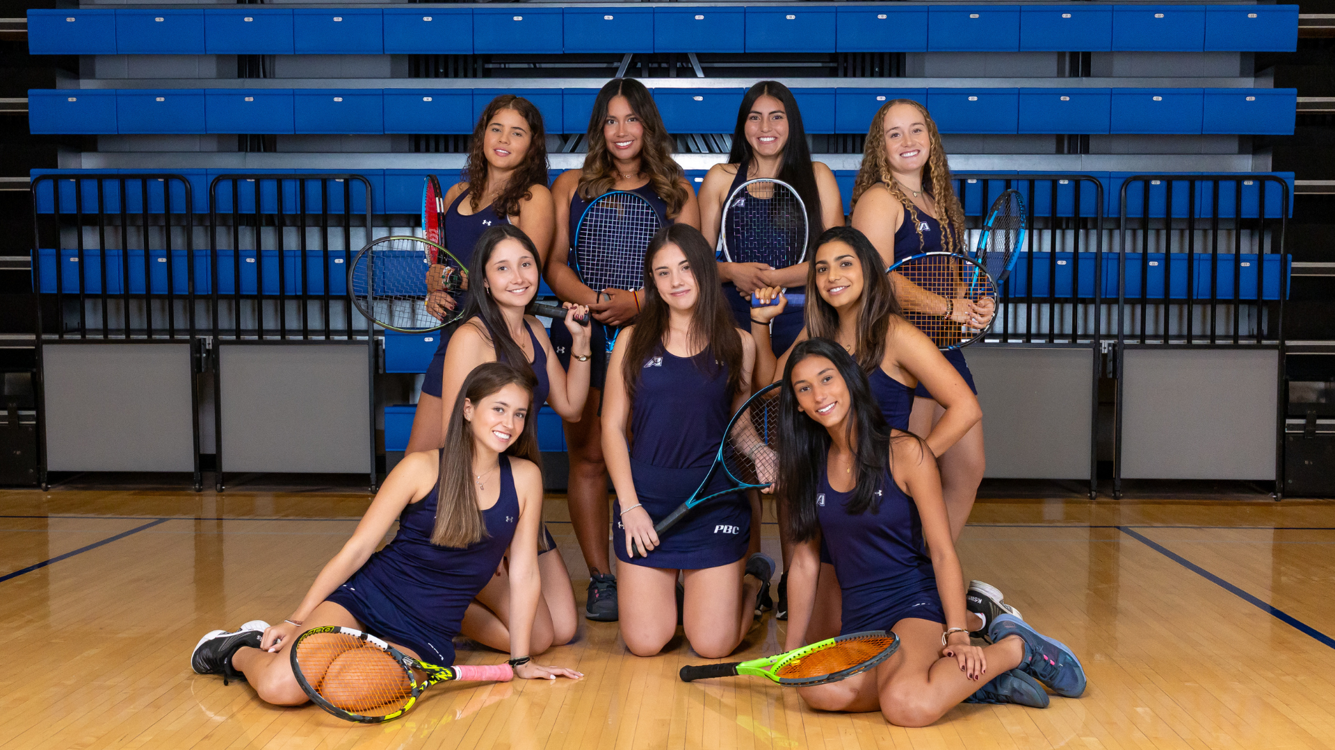 2025 women's tennis team posing for team photo