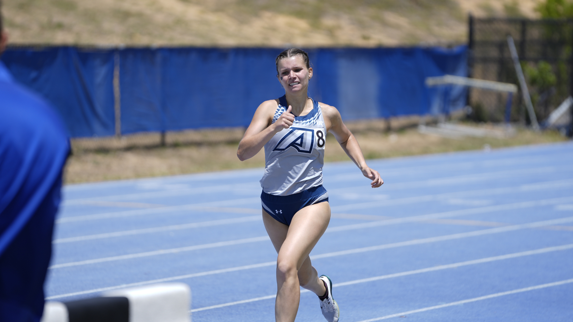 women's track & field runner