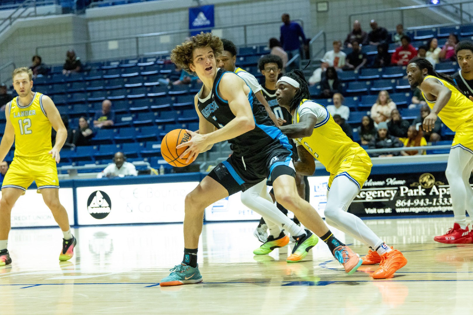 Augusta's Charlie McBeath makes a move against Lander