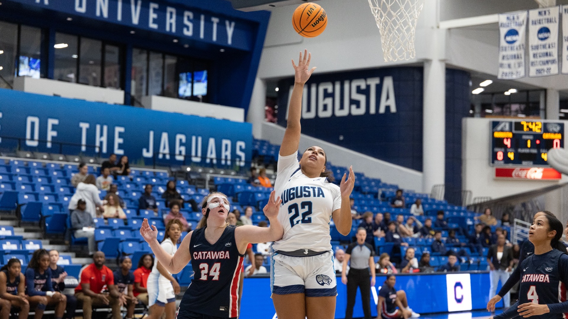 Chloe Ross goes up for a  basket