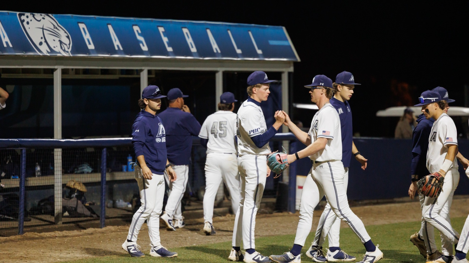 Augusta celebrates on the baseball diamond