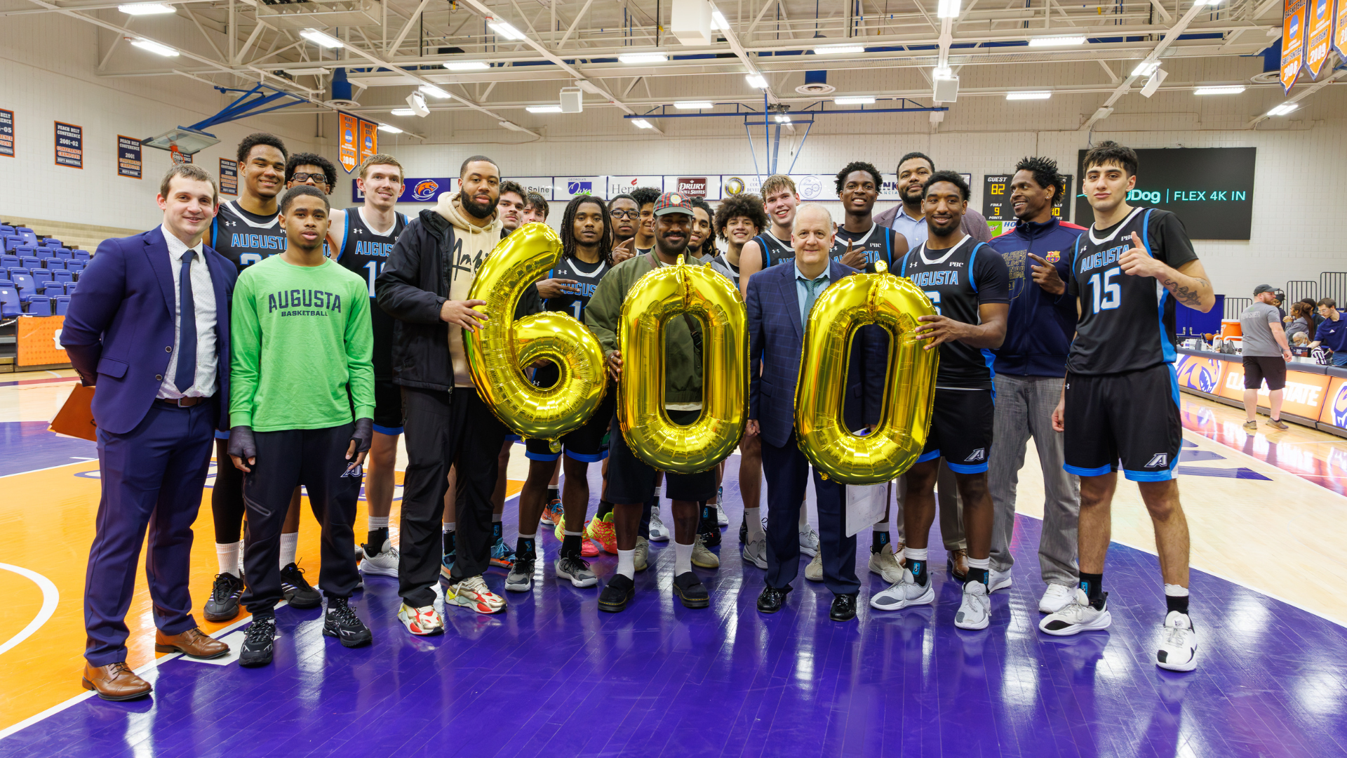 Head coach dip metress celebrates 600th career win with men's basketball team