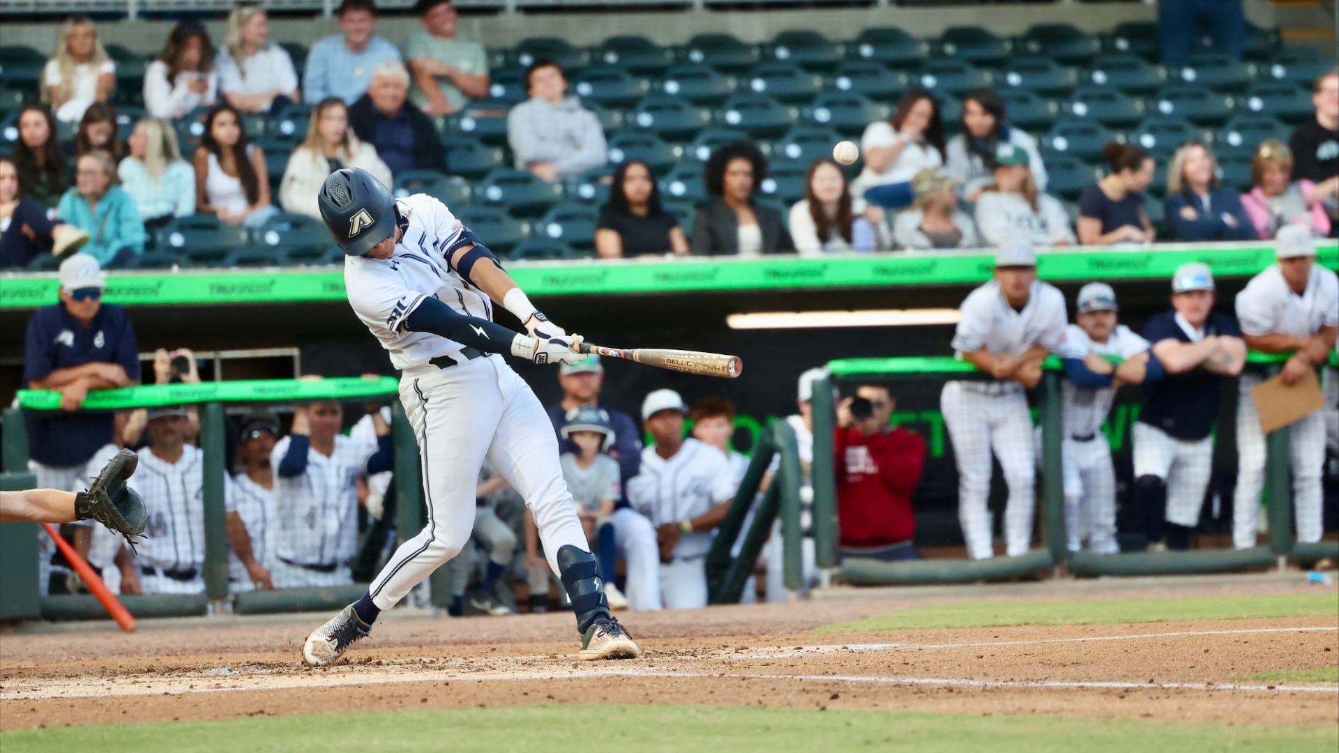 Augusta baseball player swings
