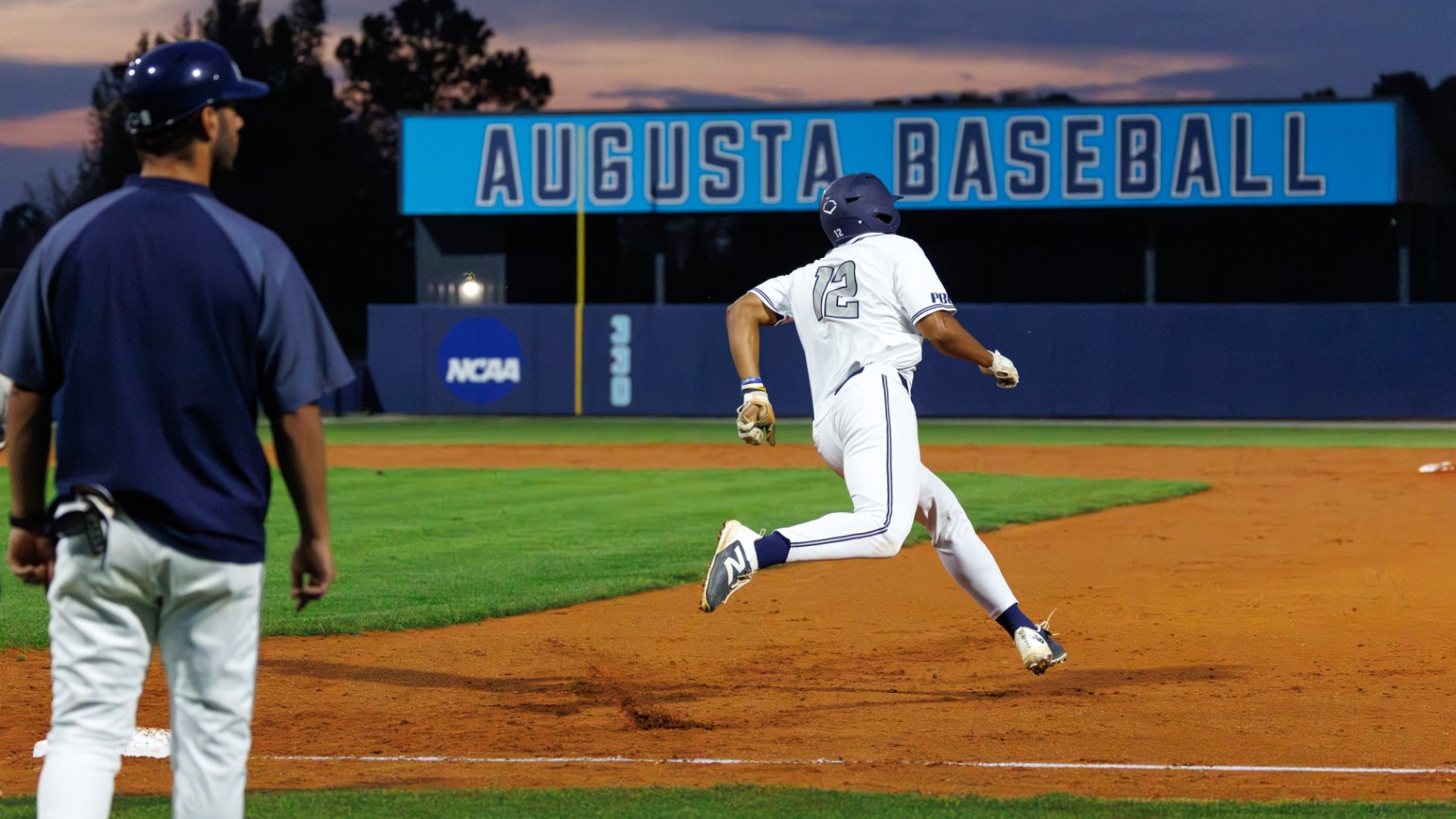 An Augusta baserunner rounds first