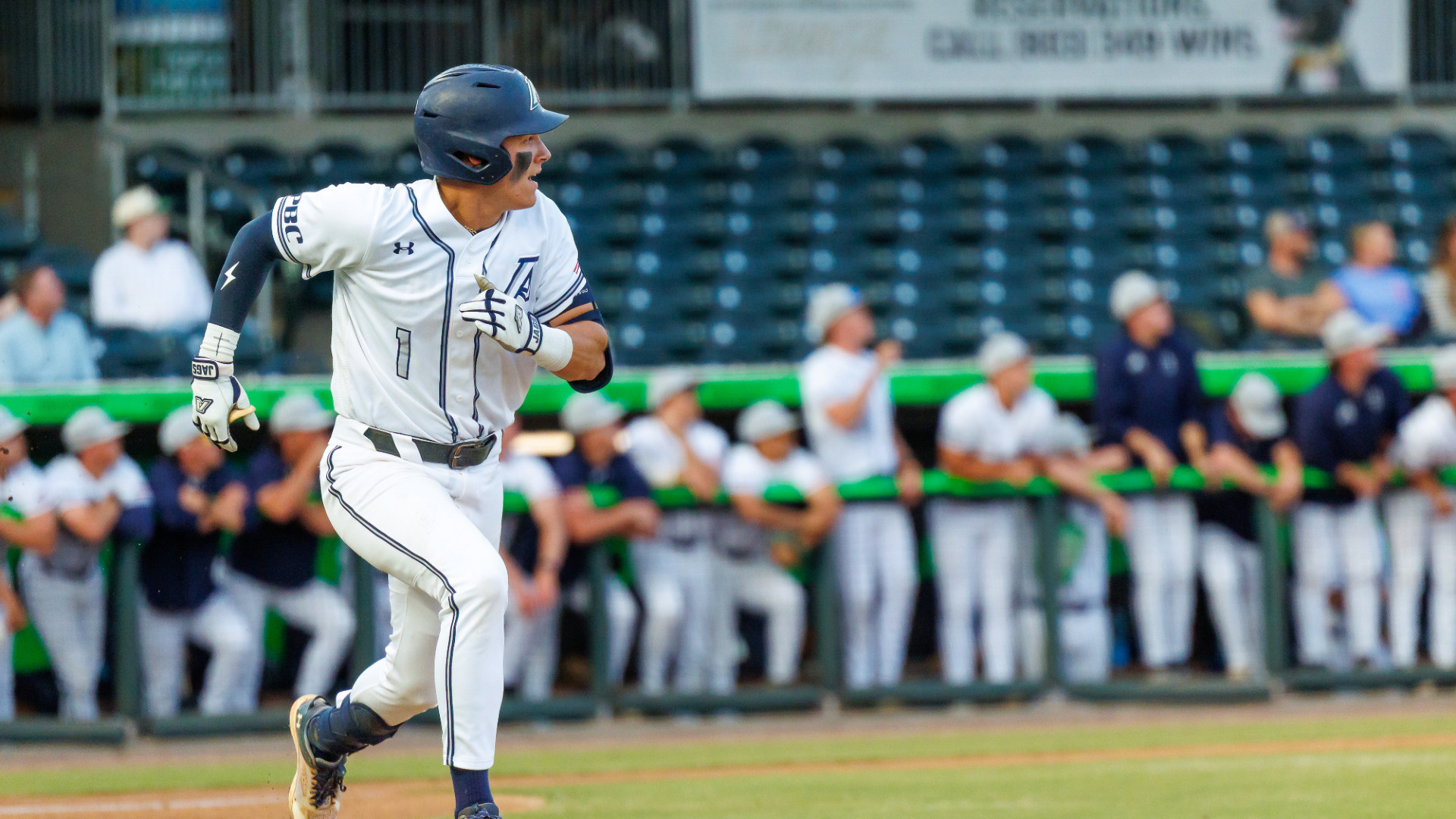 KJ Moon races to first base