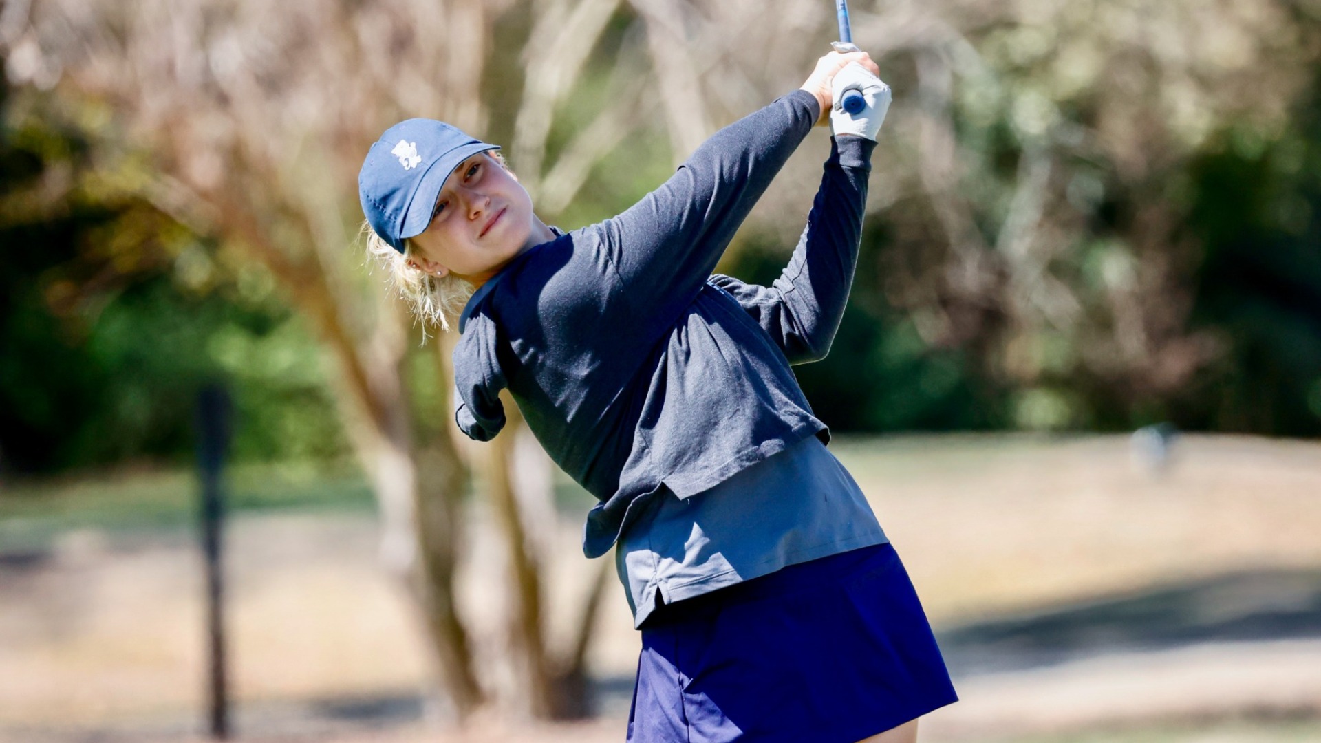 Danielle Higbee tees off