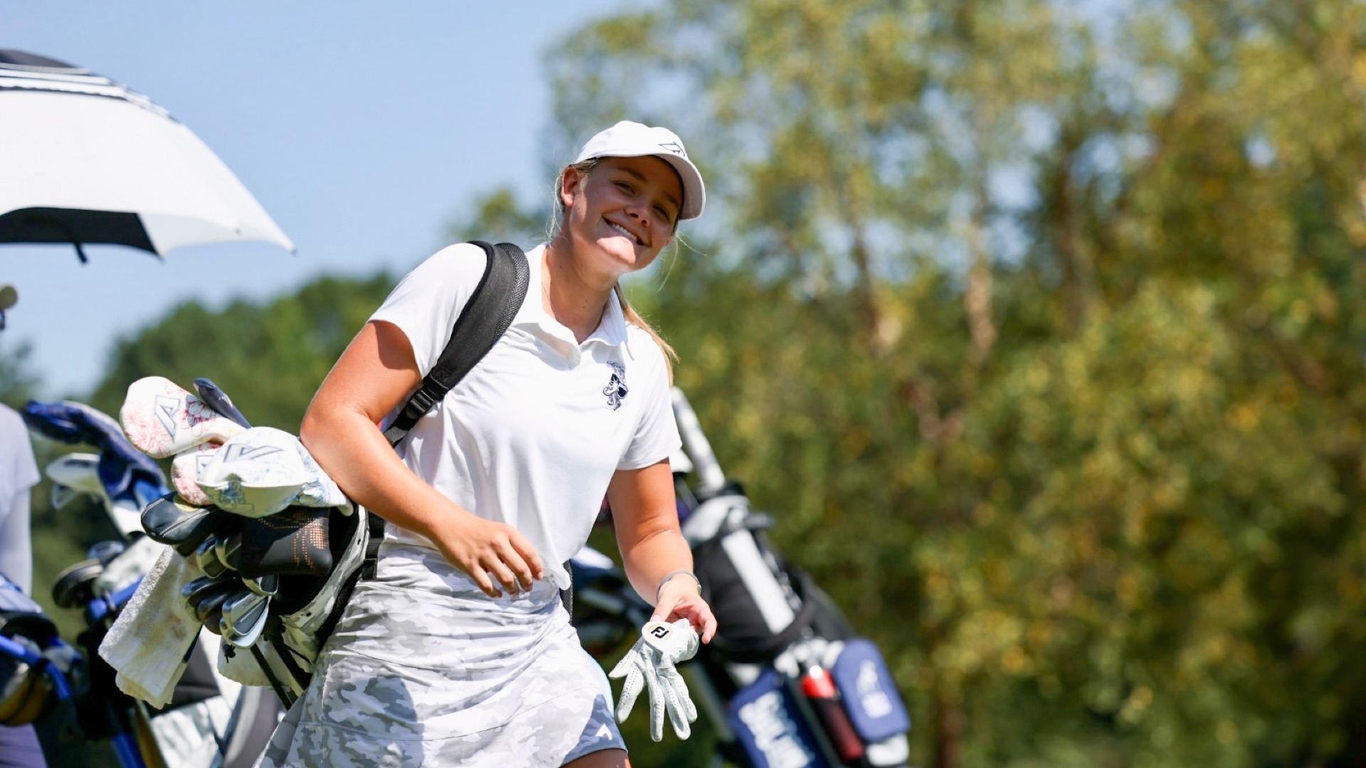 Sara Adams walks the fairway