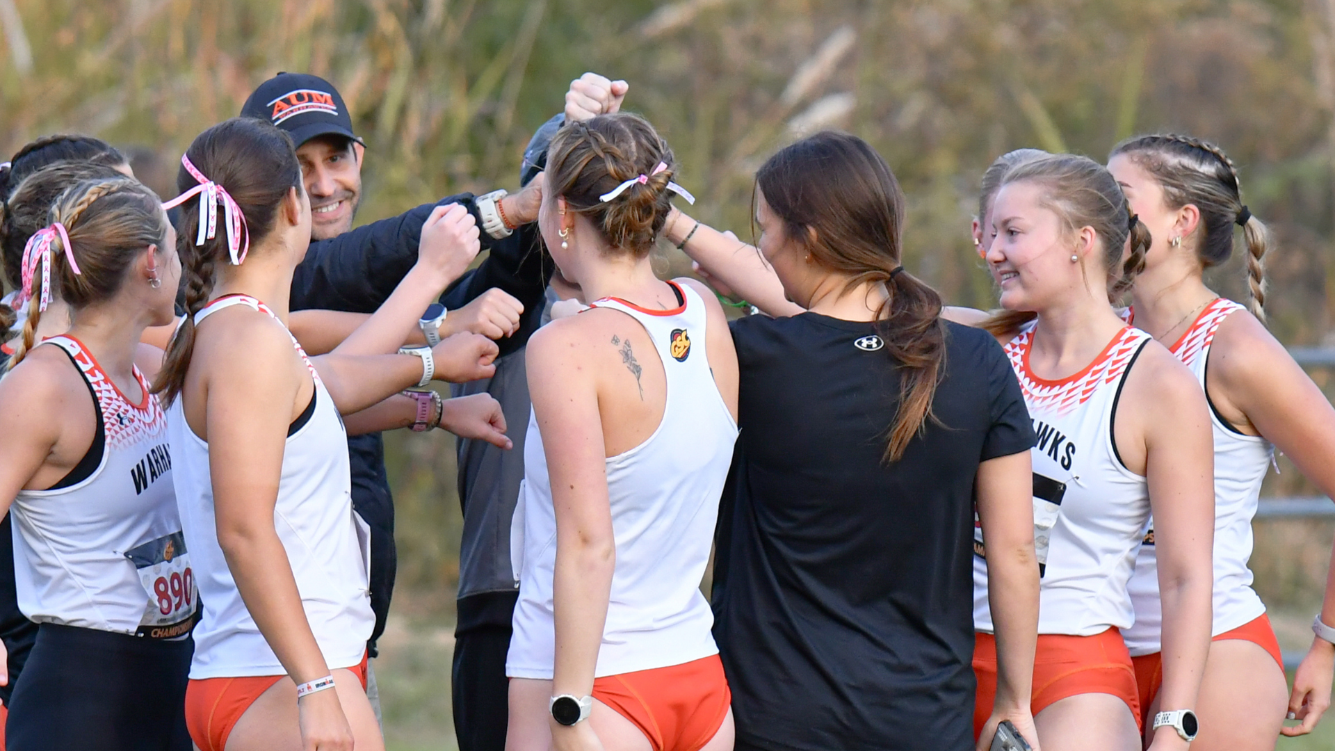 Women's XC Huddle for QCI