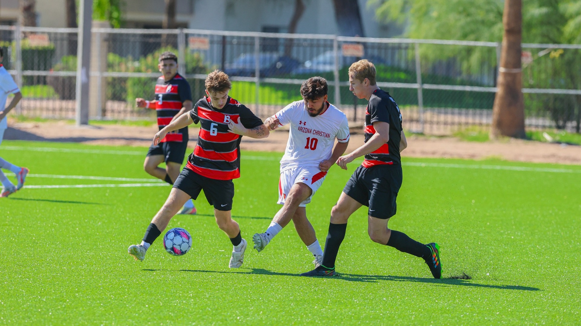 ACU's Marcos Mora has possession