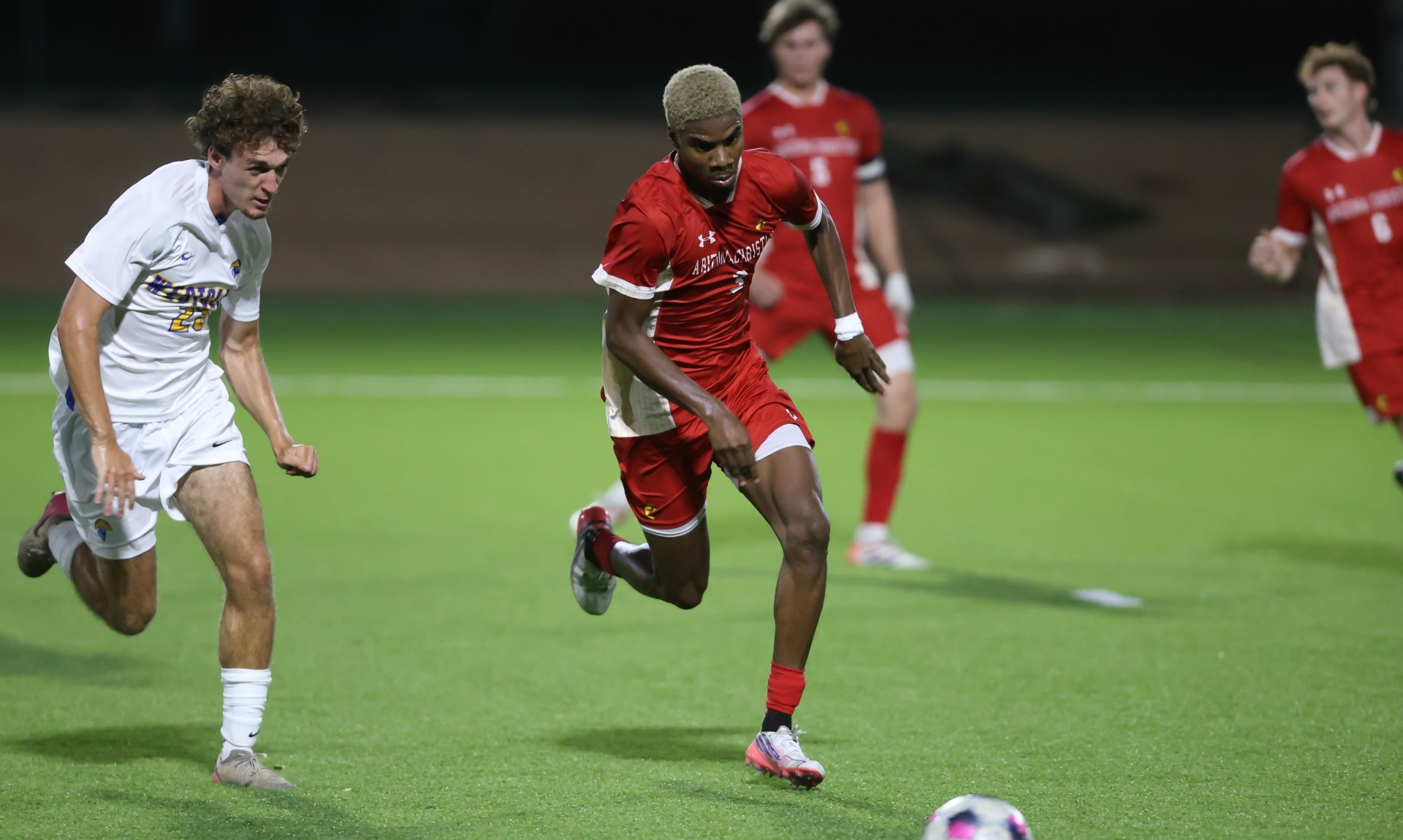 ACU's Nikarro Williams with the ball