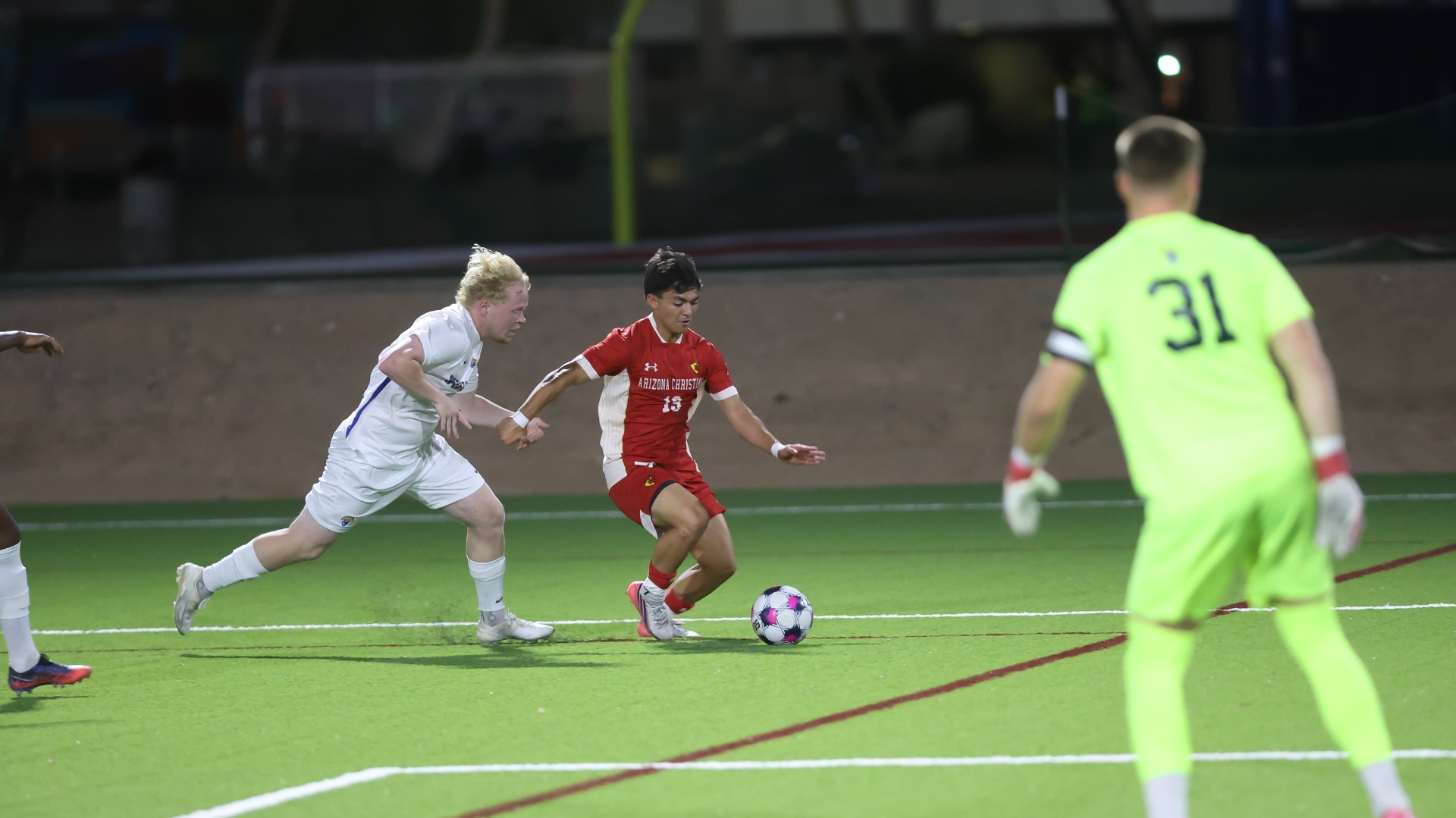 ACU's Sammy Kopalyan with the ball
