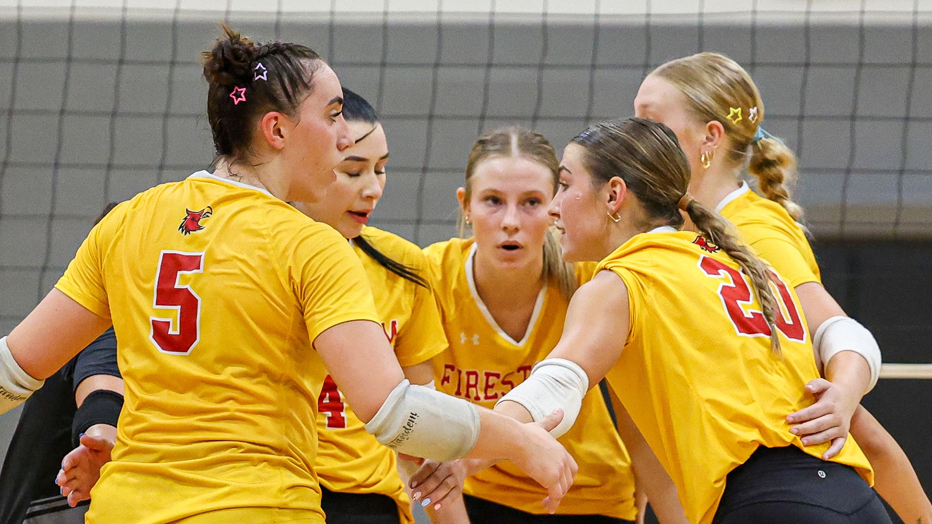 Yellow WVB Huddle
