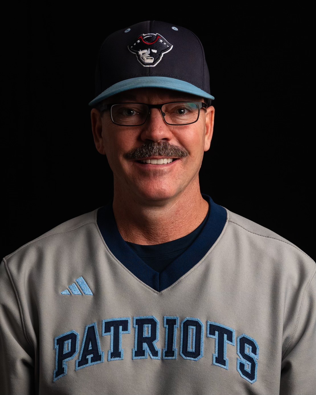 Coach Aaron Kutilek