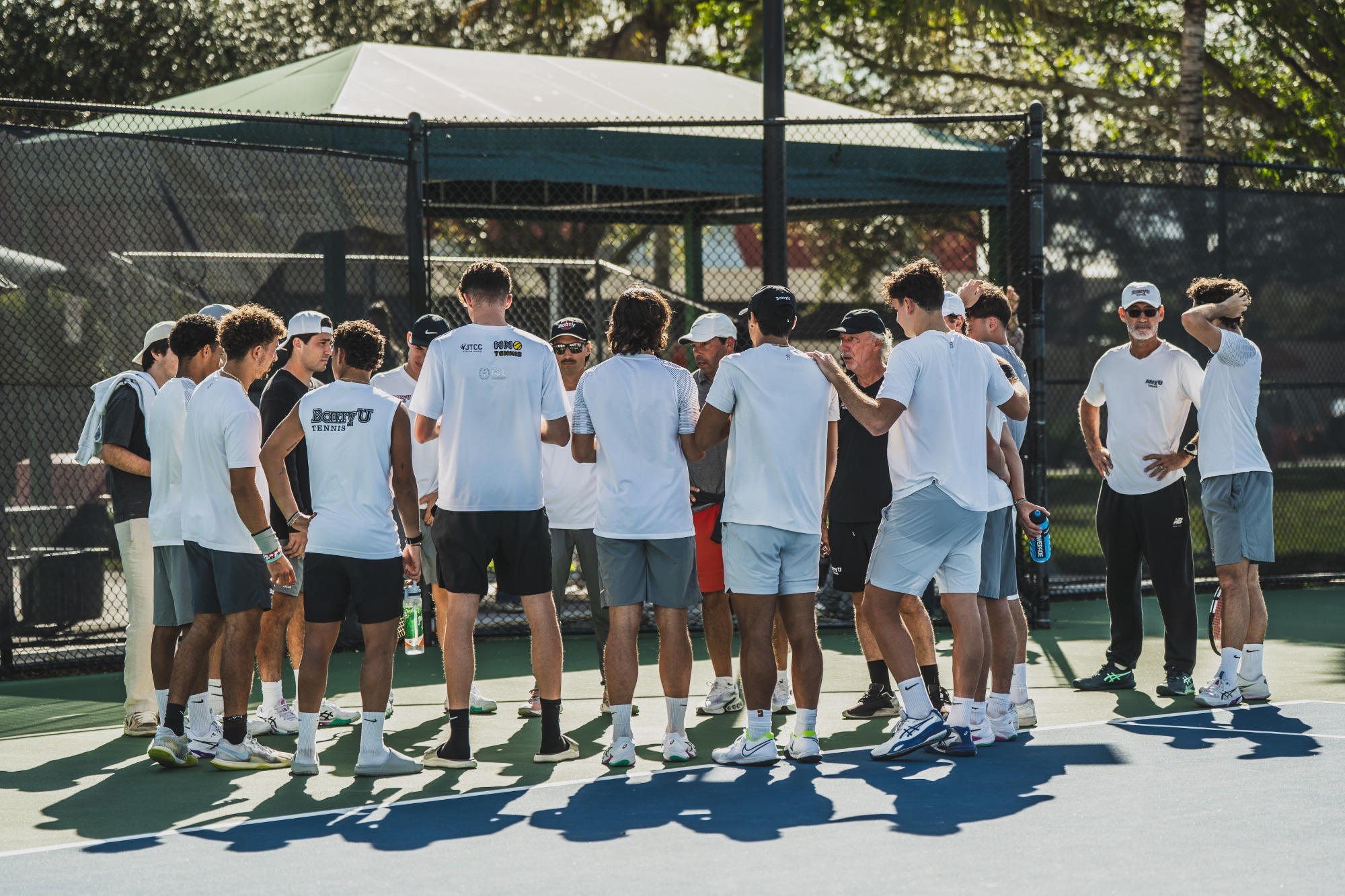 Men's Tennis Team before win over St. Thomas
