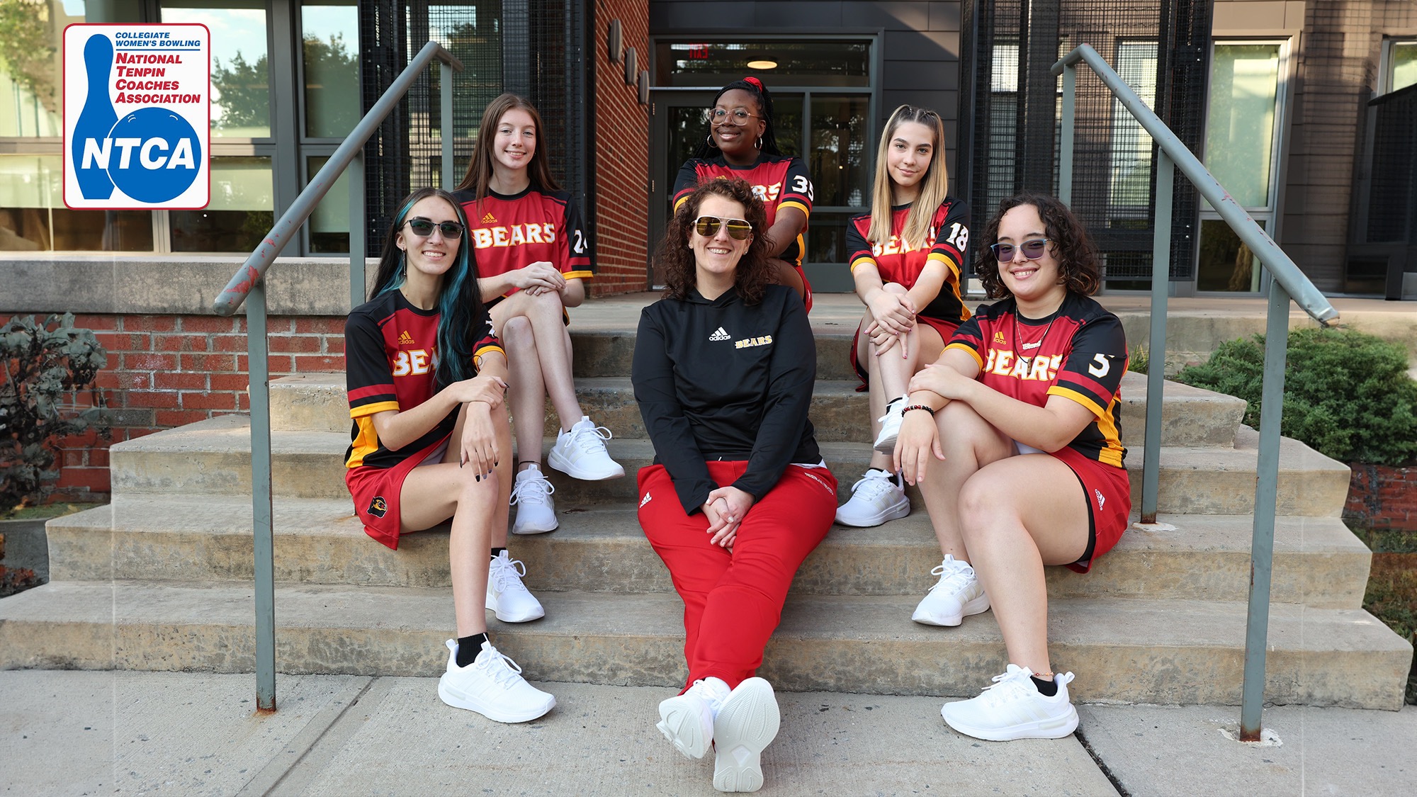 The 2023-24 Bears Women's Bowling Team posing for a group picture on the steps of the Creative Arts building