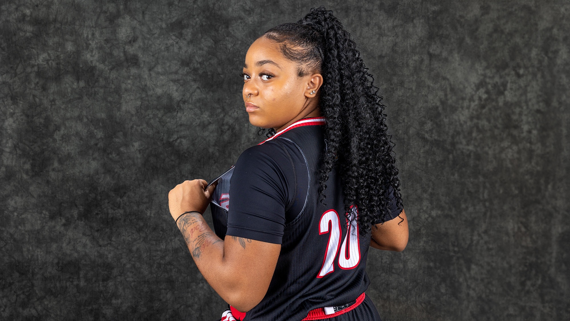 Kayla Lewis poses for women's basketball 2025 Media Day