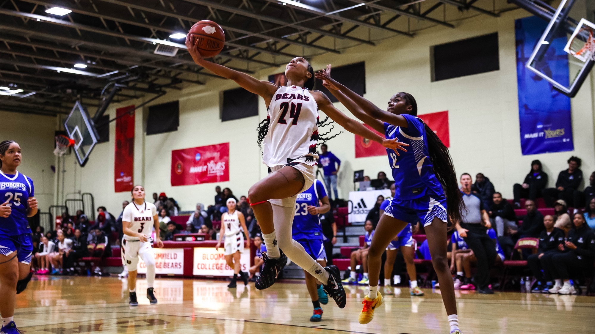Nia Mallette glides past Bobcats defender in The Den