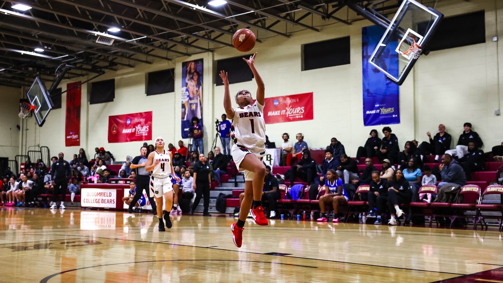 Bianca Ellis dribbles in for a layup against Bobcats