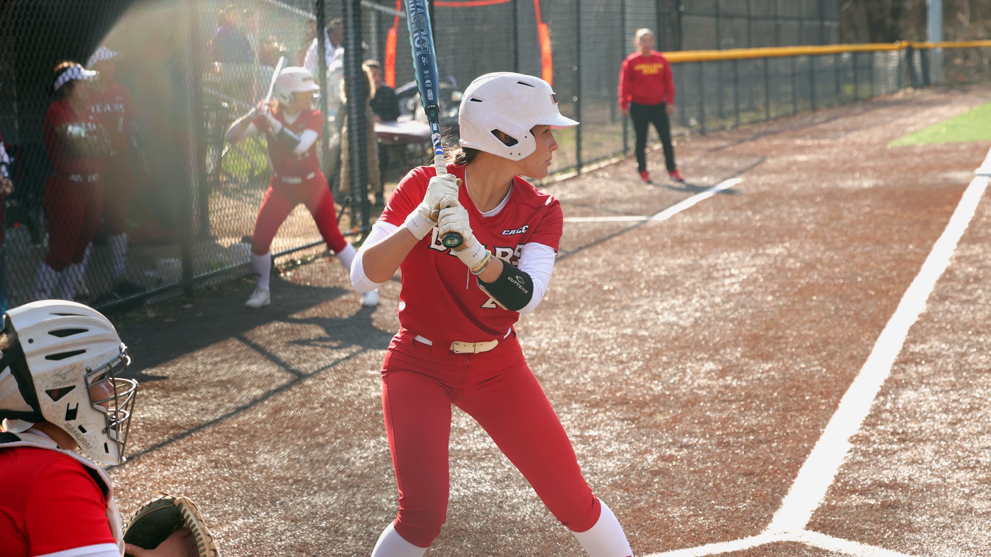 Hailey Conner ready for the pitch in a home game for Bloomfield softball