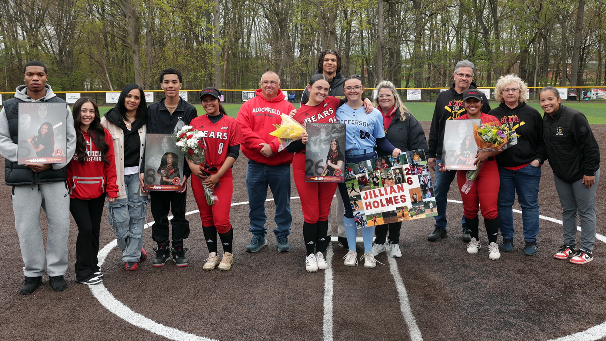 Softball program seniors with their families on Senior Day
