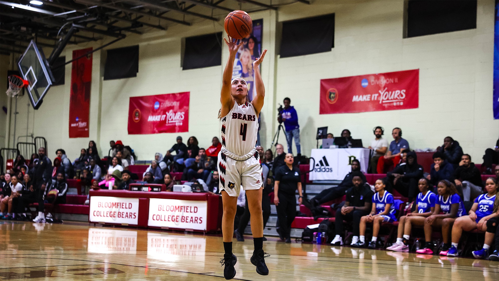 Ania Martinez takes a jumper during a USCAA game