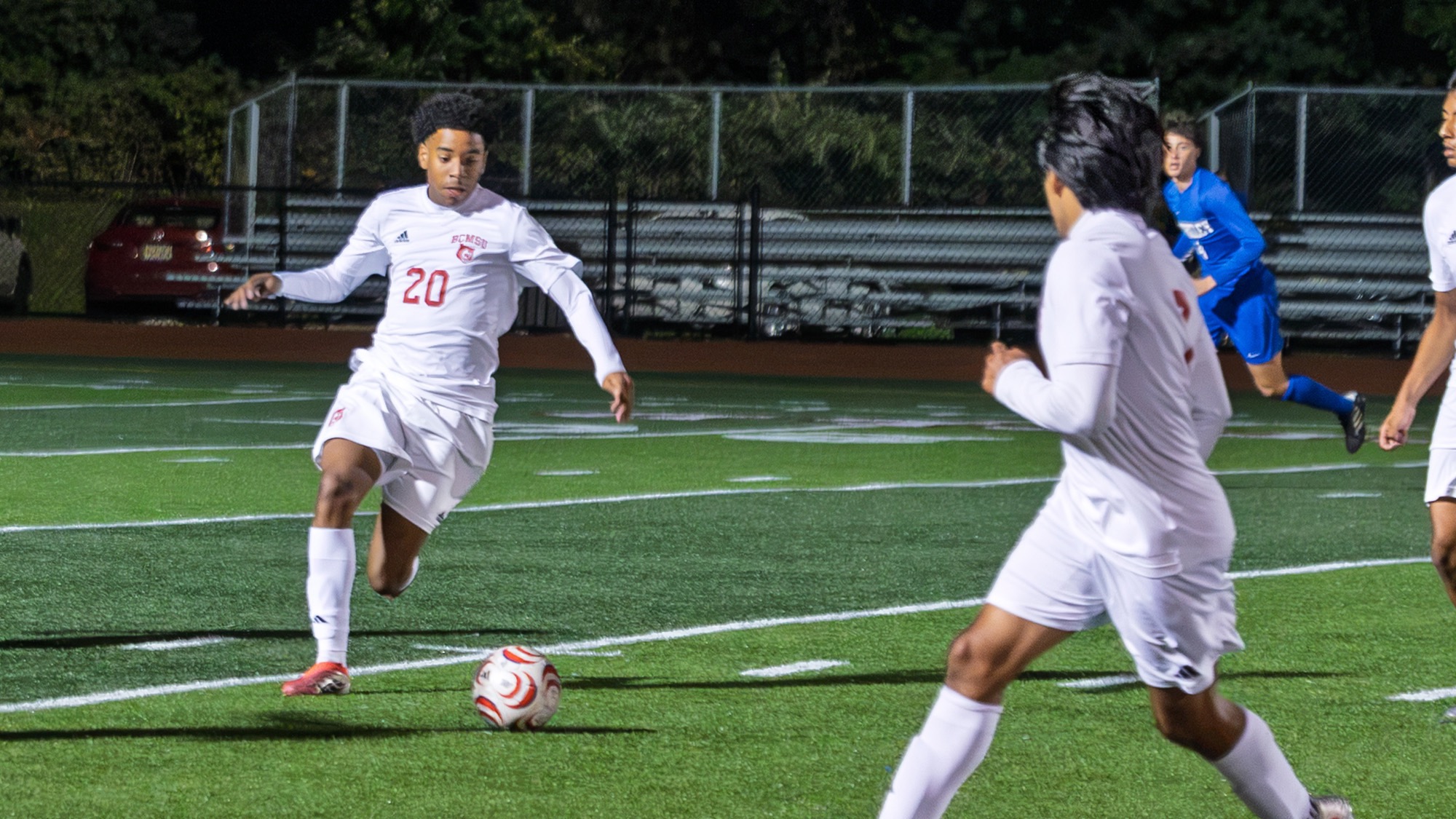Ivan Maiato dribbles past a defender on Foley Field