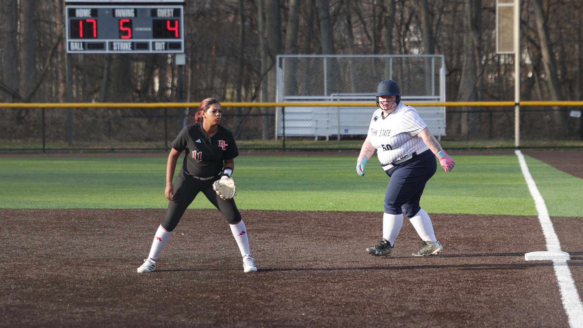 Jaida Hastings holding a Penn State Hazelton runner at first base