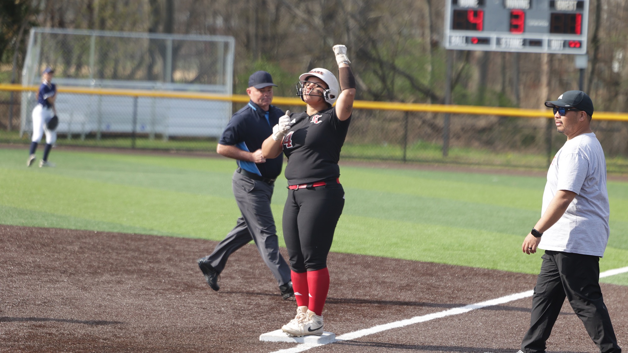 Isabella celebrating a base hit on Carla D Ward Field
