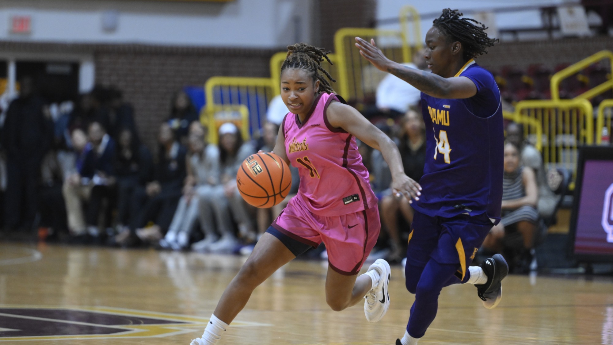 Alexandria Johnson dribbles against PVAMU