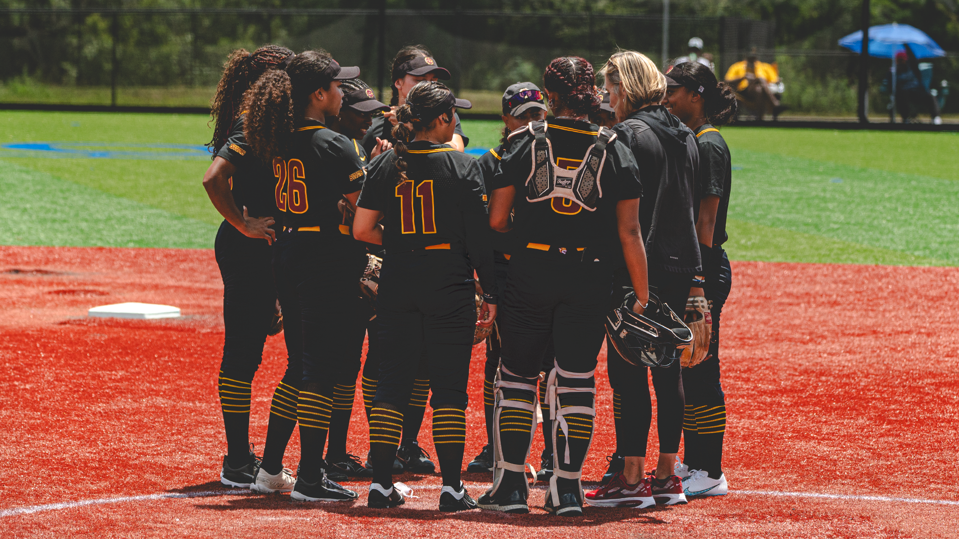 Softball Team Huddle at Guflport Sportsplex