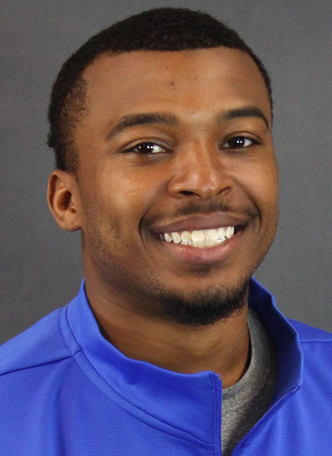 Stokes headshot on gray background