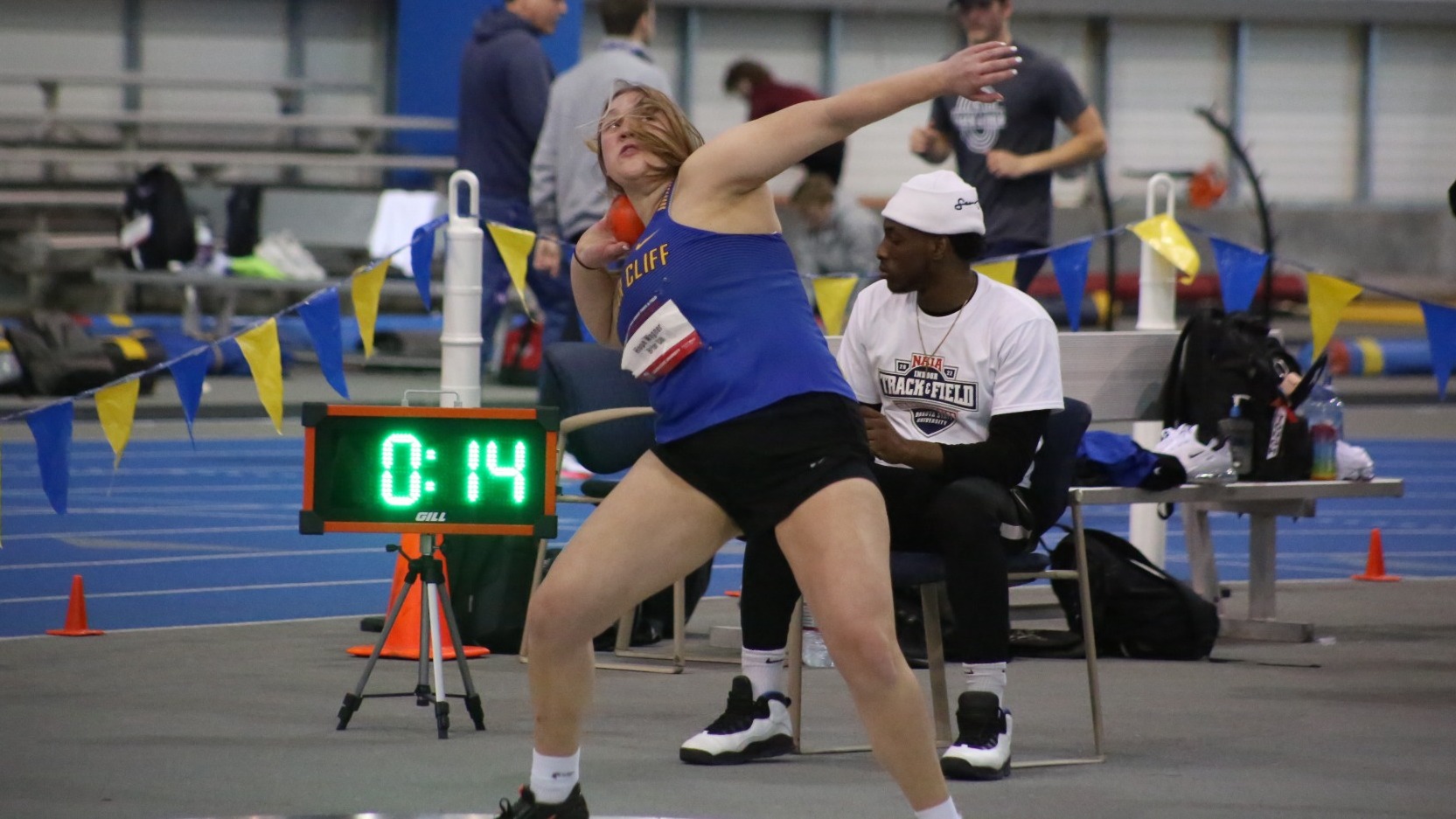 Hope Wagner throwing shot put at 2022 NAIA Indoor Track and Field Championships