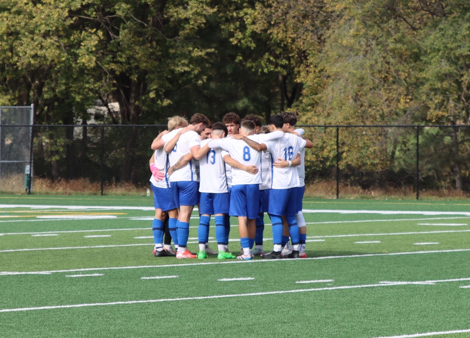 Mens soccer huddle 